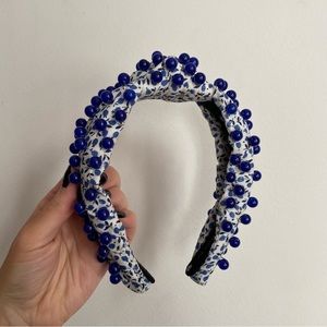 Lele Sadoughi Liberty floral headband with beads.